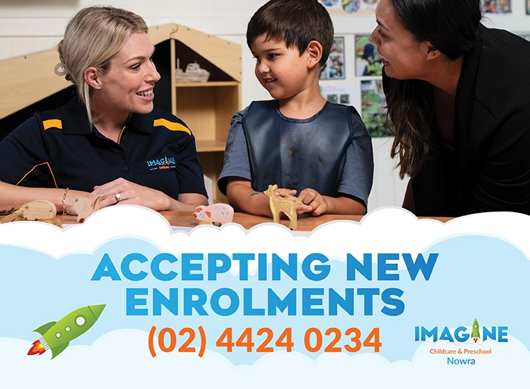 Teacher and a woman talk with a young boy at a childcare center; banner below says 'Accepting New Enrolments' with (02) 4424 0234.